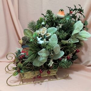 Festive Gold Holiday Sleigh with Greenery and Accents